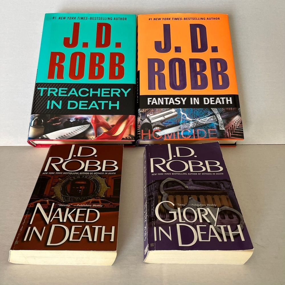 J.D. Robb book bundle of‎ four (4) used books. Glory in Death Naked in Death